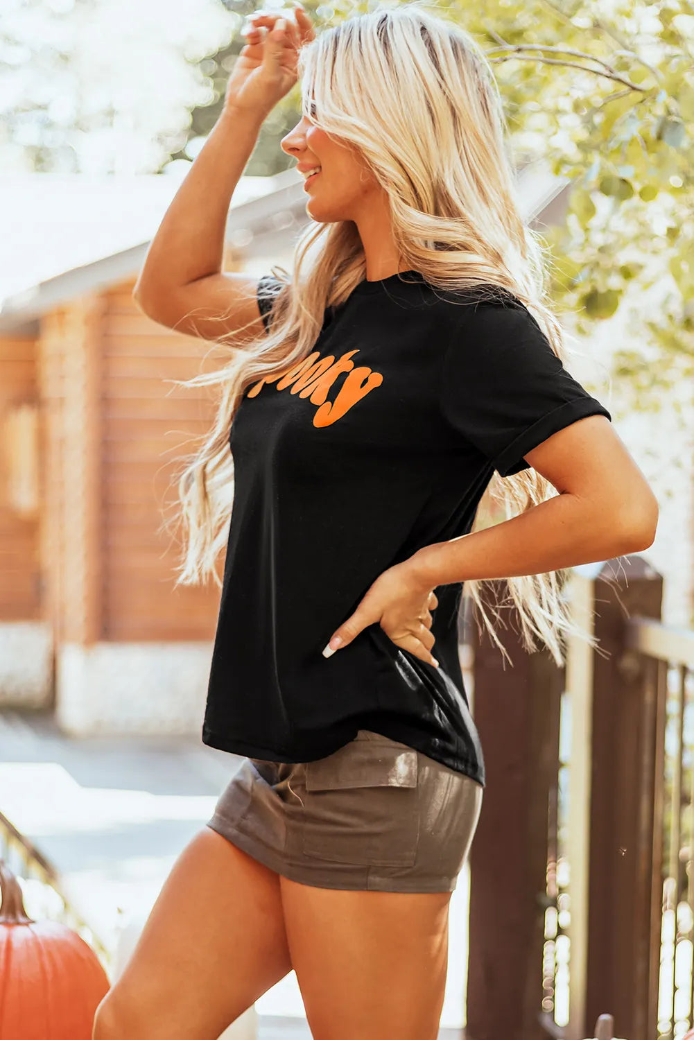 Side view of SPOOKY black round neck t-shirt