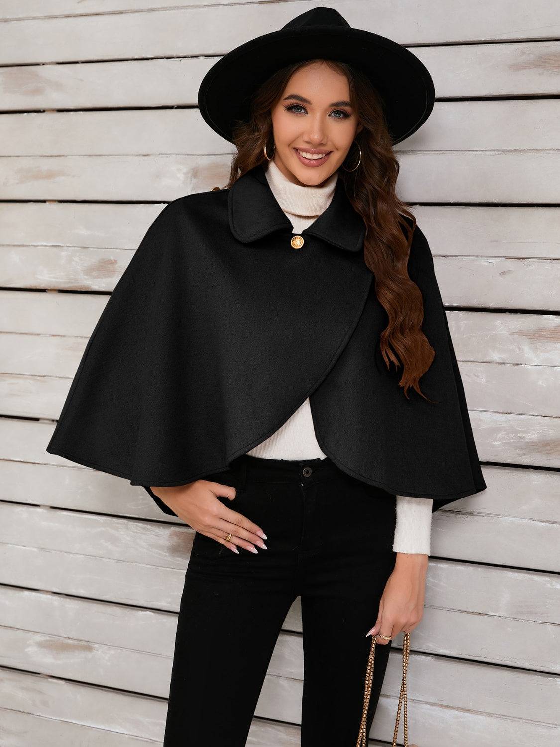 Black collared neck cropped cape with hat, front view