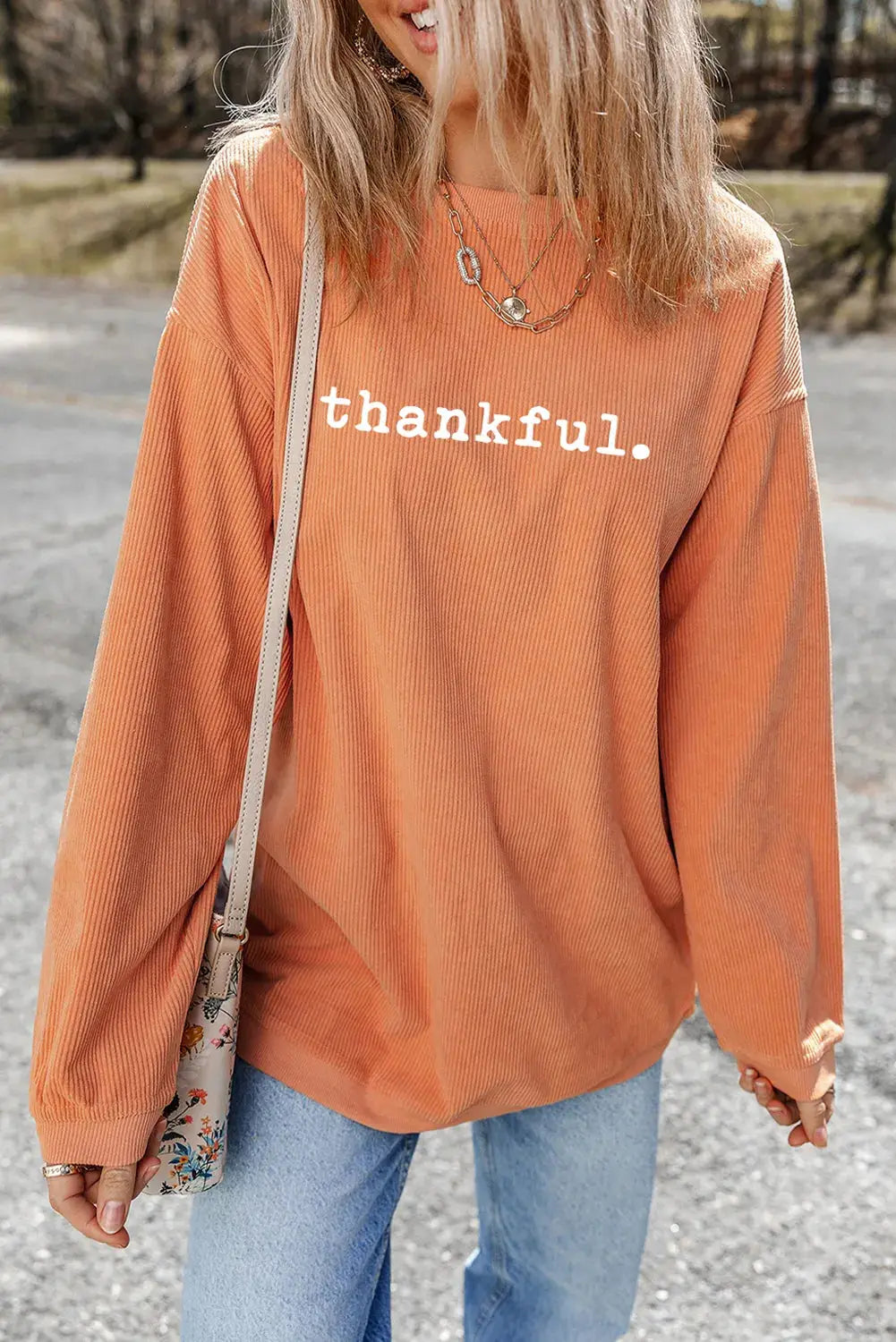 THANKFUL orange round neck long sleeve sweatshirt front view