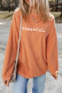THANKFUL orange round neck long sleeve sweatshirt front view