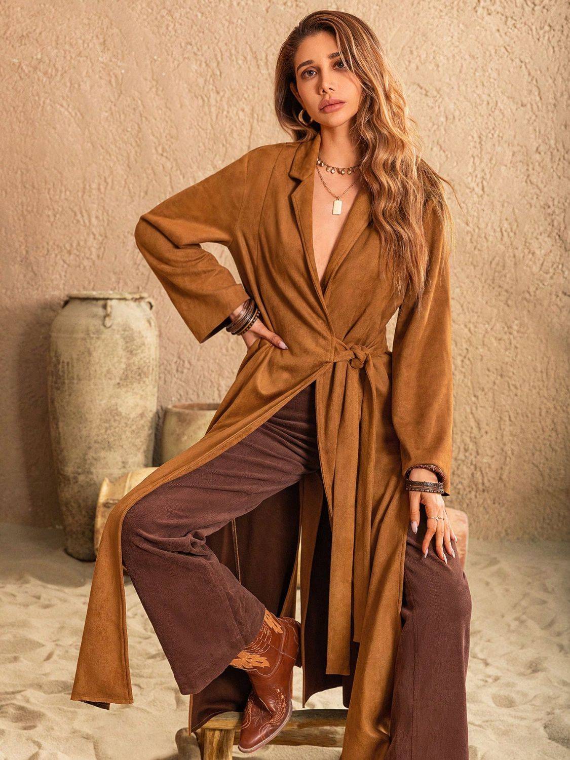Sitting pose in brown slit tied collared neck longline coat