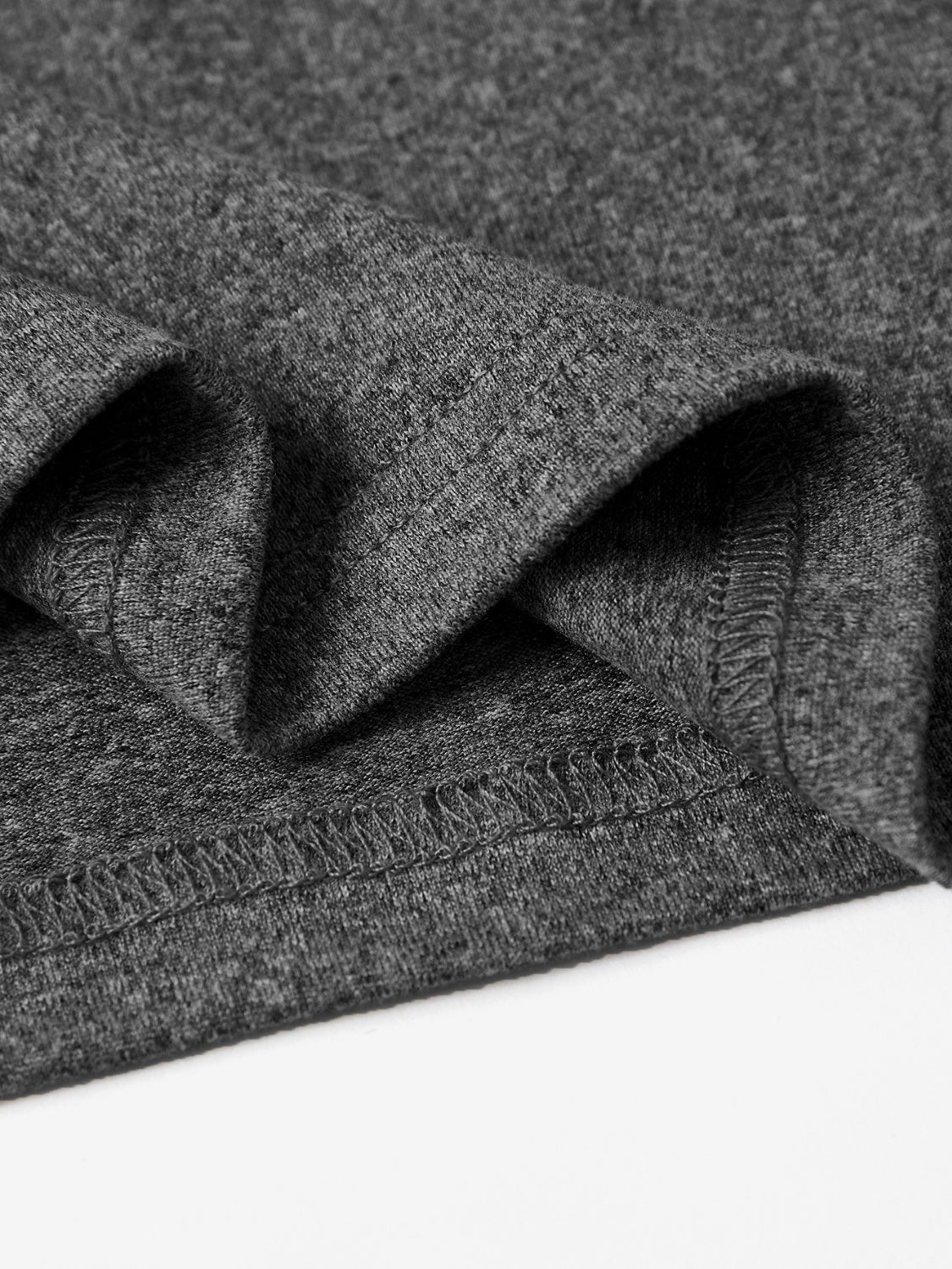 Close-up of gray T-shirt fabric and stitching