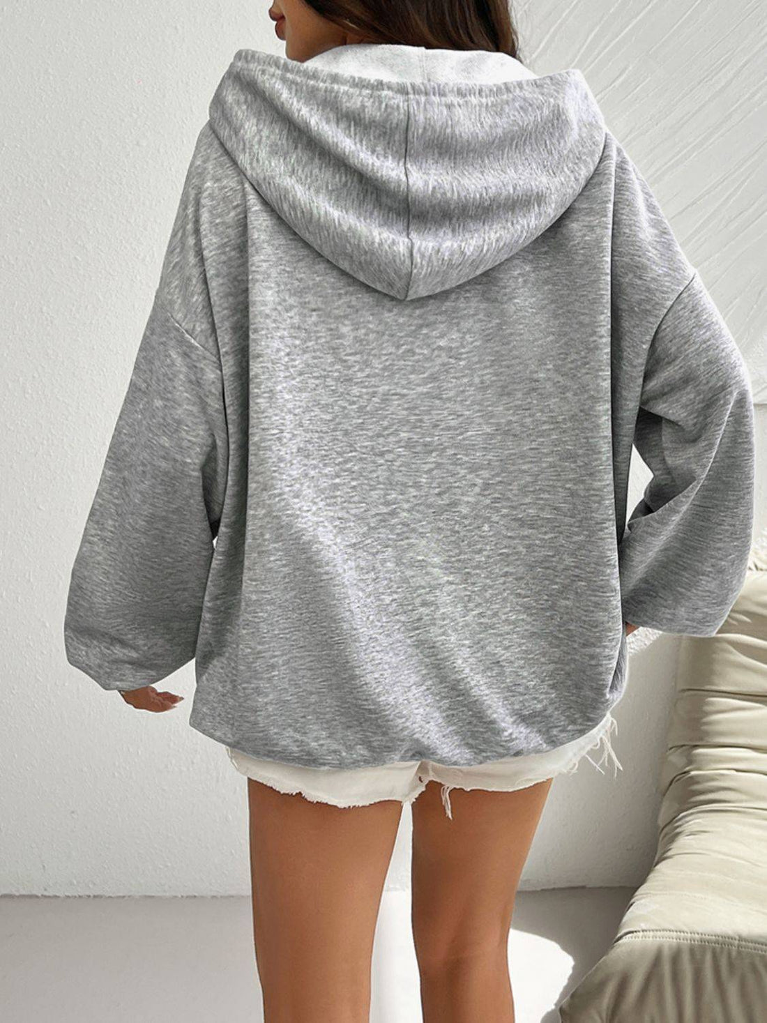Gray hoodie with US flag, back view