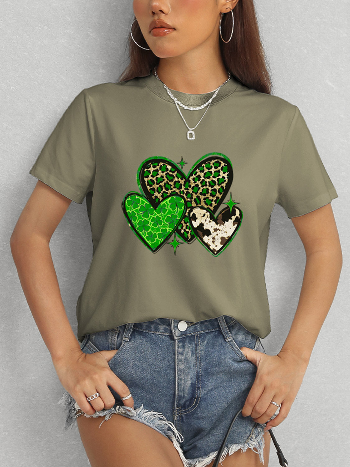 Olive t-shirt featuring green heart design