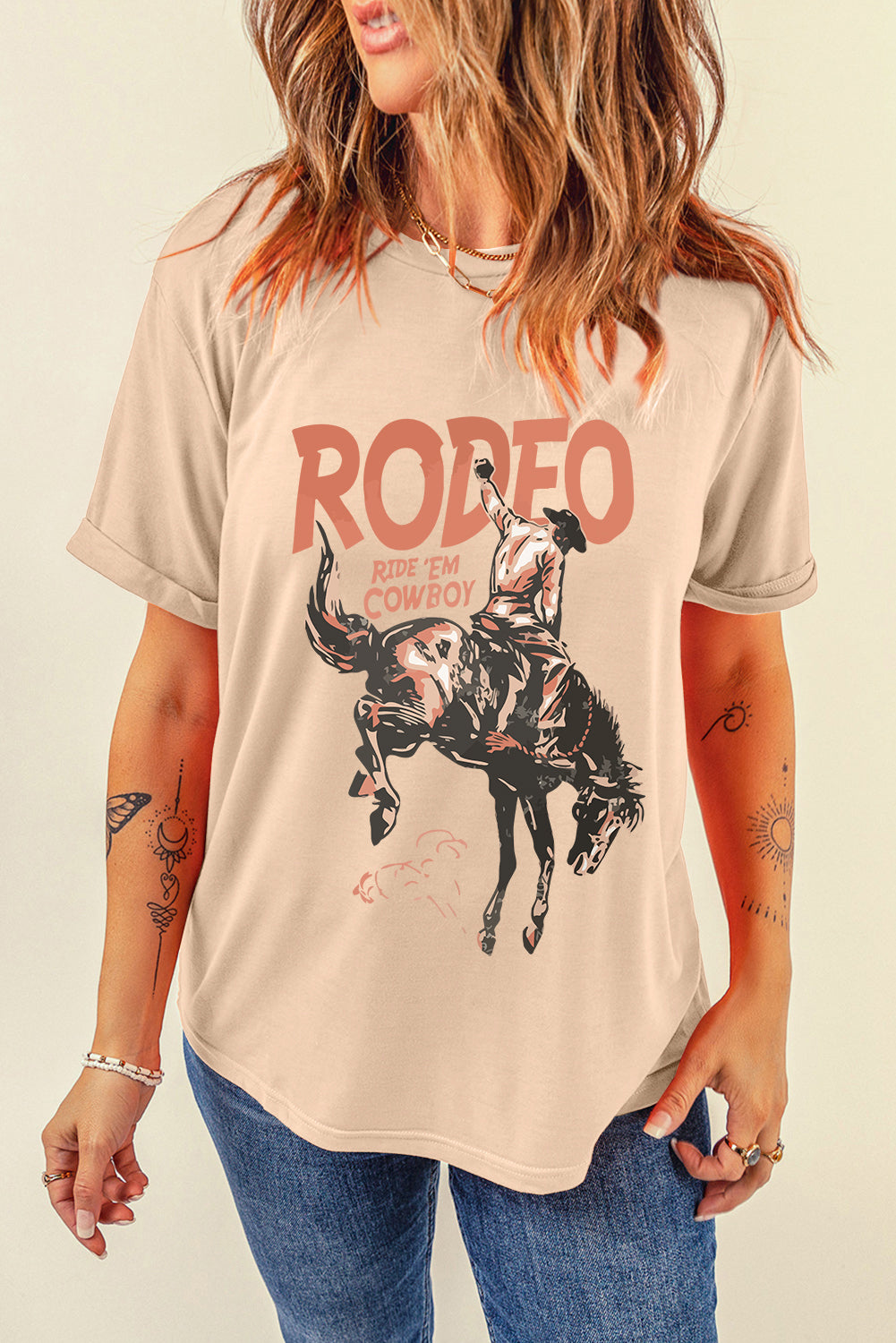 Beige cowboy graphic round neck t-shirt, short sleeves.