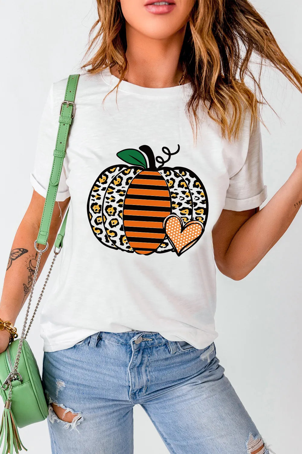 Casual pumpkin graphic T-shirt, styled with jeans