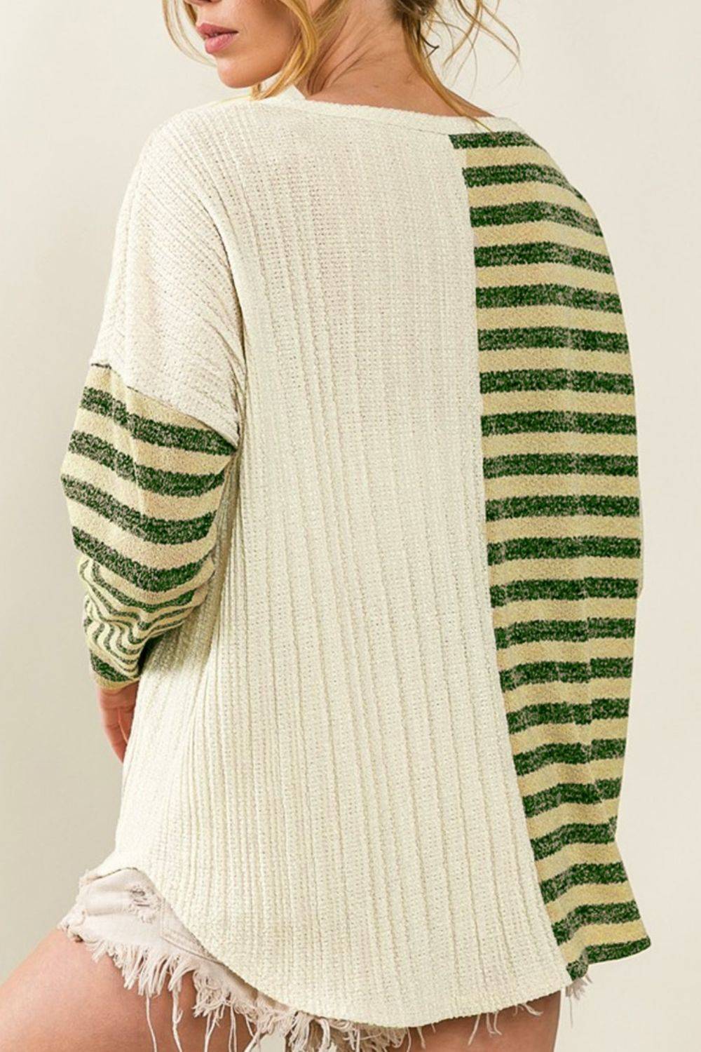 Back view of striped round neck long sleeve top