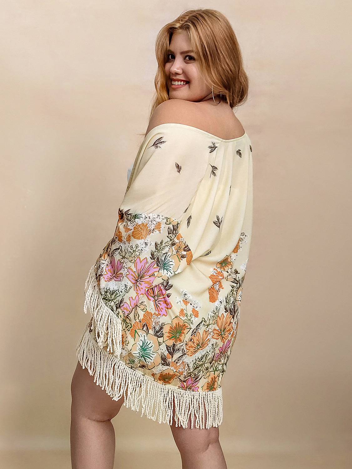 Off-shoulder floral fringe cardigan, back view