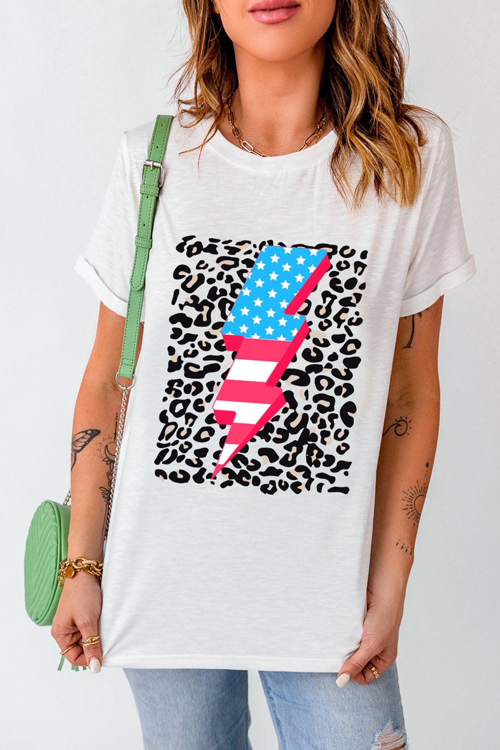 Stylish graphic t-shirt featuring leopard print and lightning bolt design