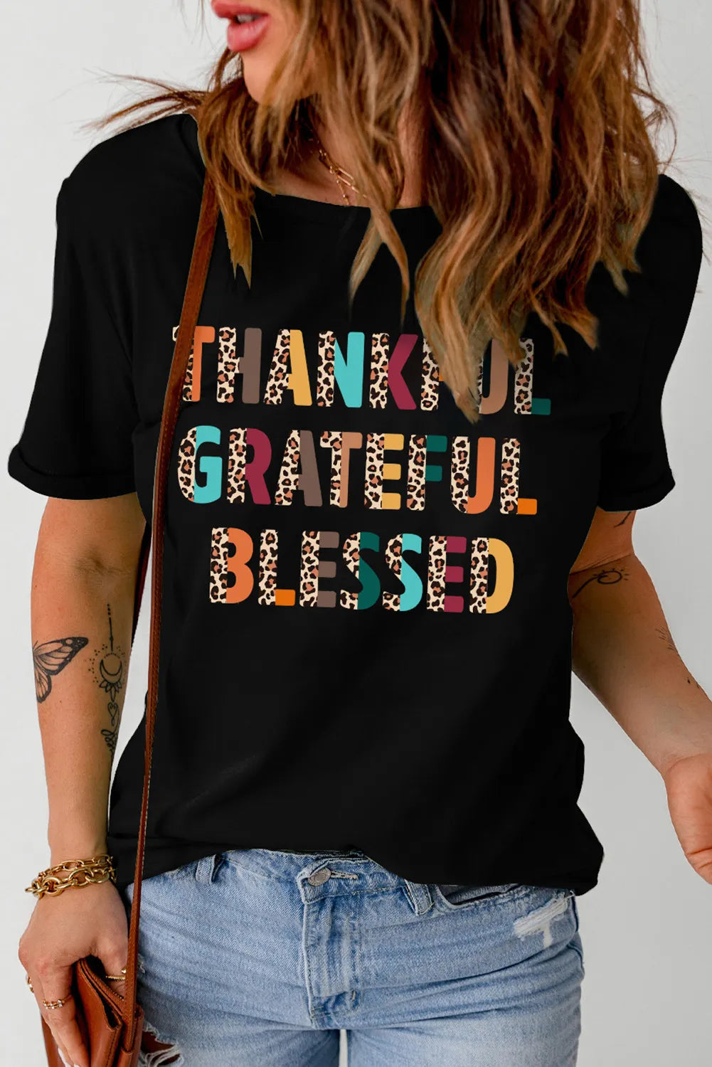 Casual black T-shirt with colorful letter graphic
