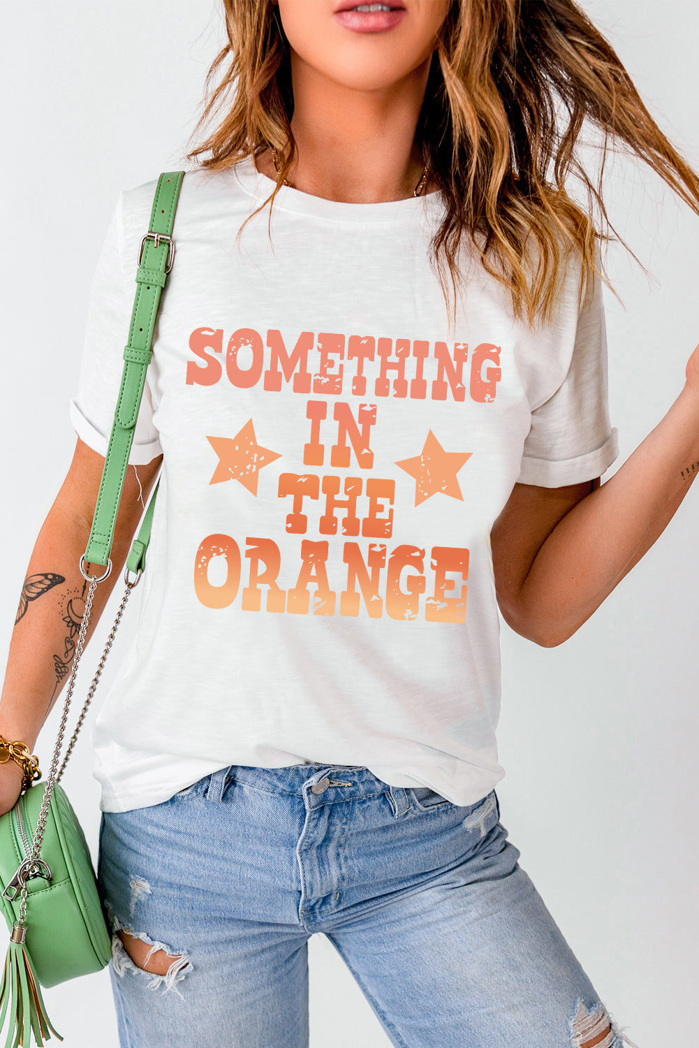 Round neck T-shirt with orange letter graphic