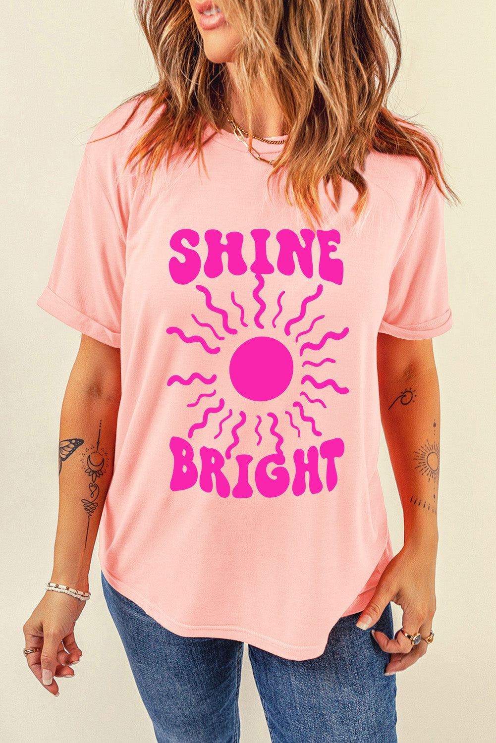 Pink SHINE BRIGHT T-shirt with sun graphic, front view