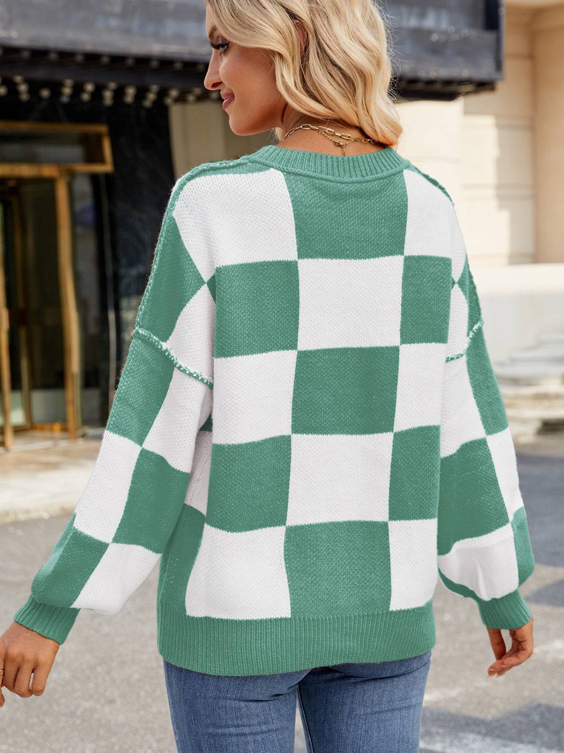 Green and white checkered round neck sweater