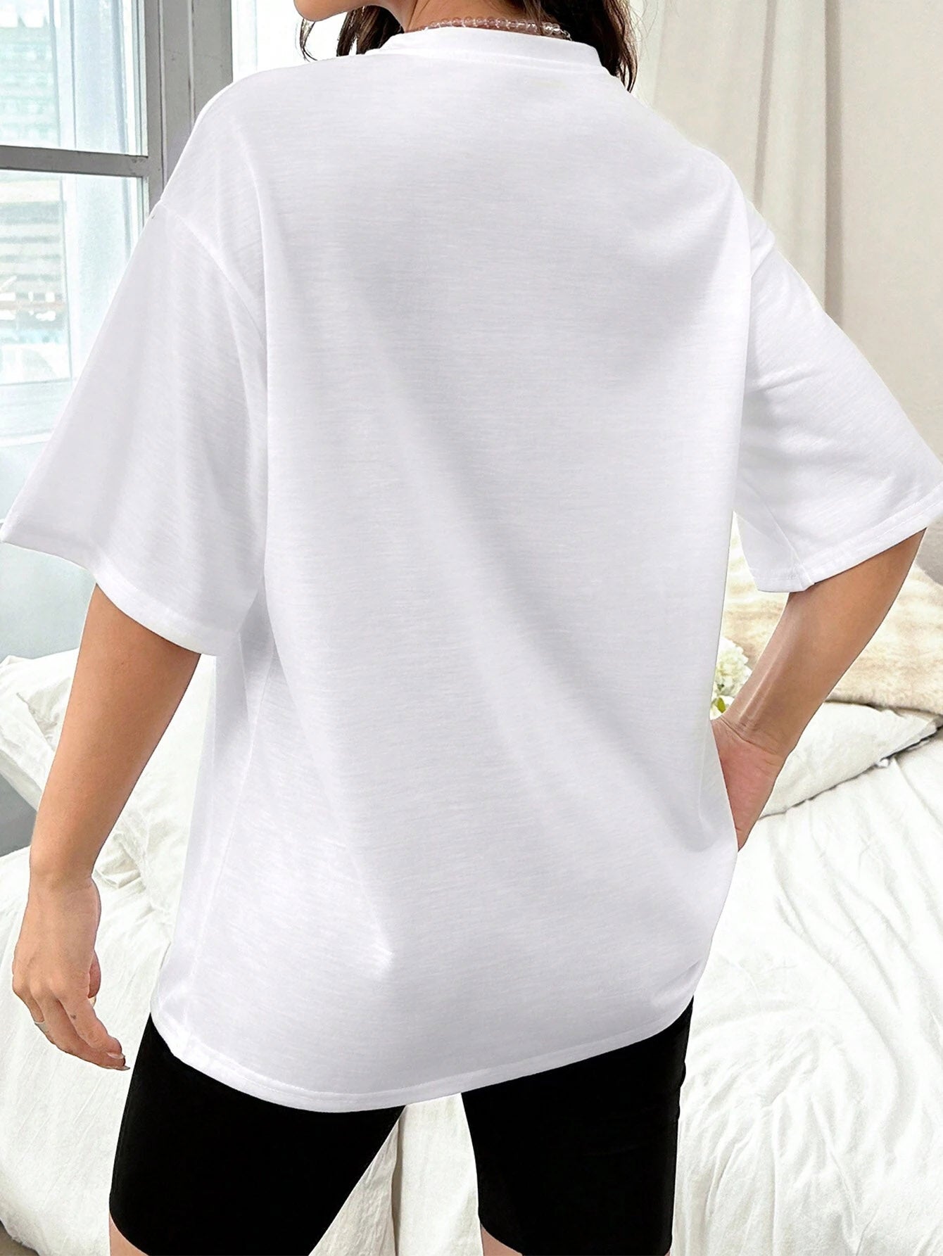 Back view of white round neck t-shirt