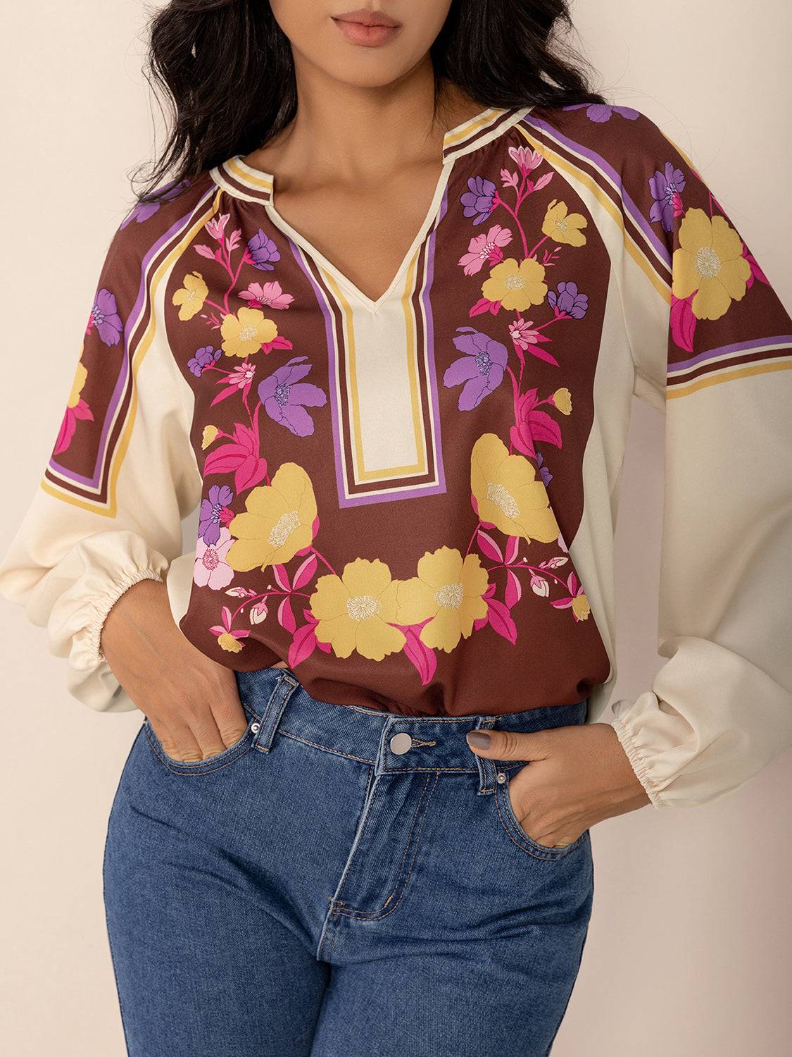 Close-up of floral printed notched blouse