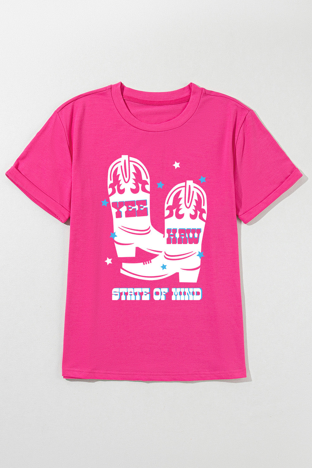 Flat lay of pink T-shirt with Yee Haw State of Mind design