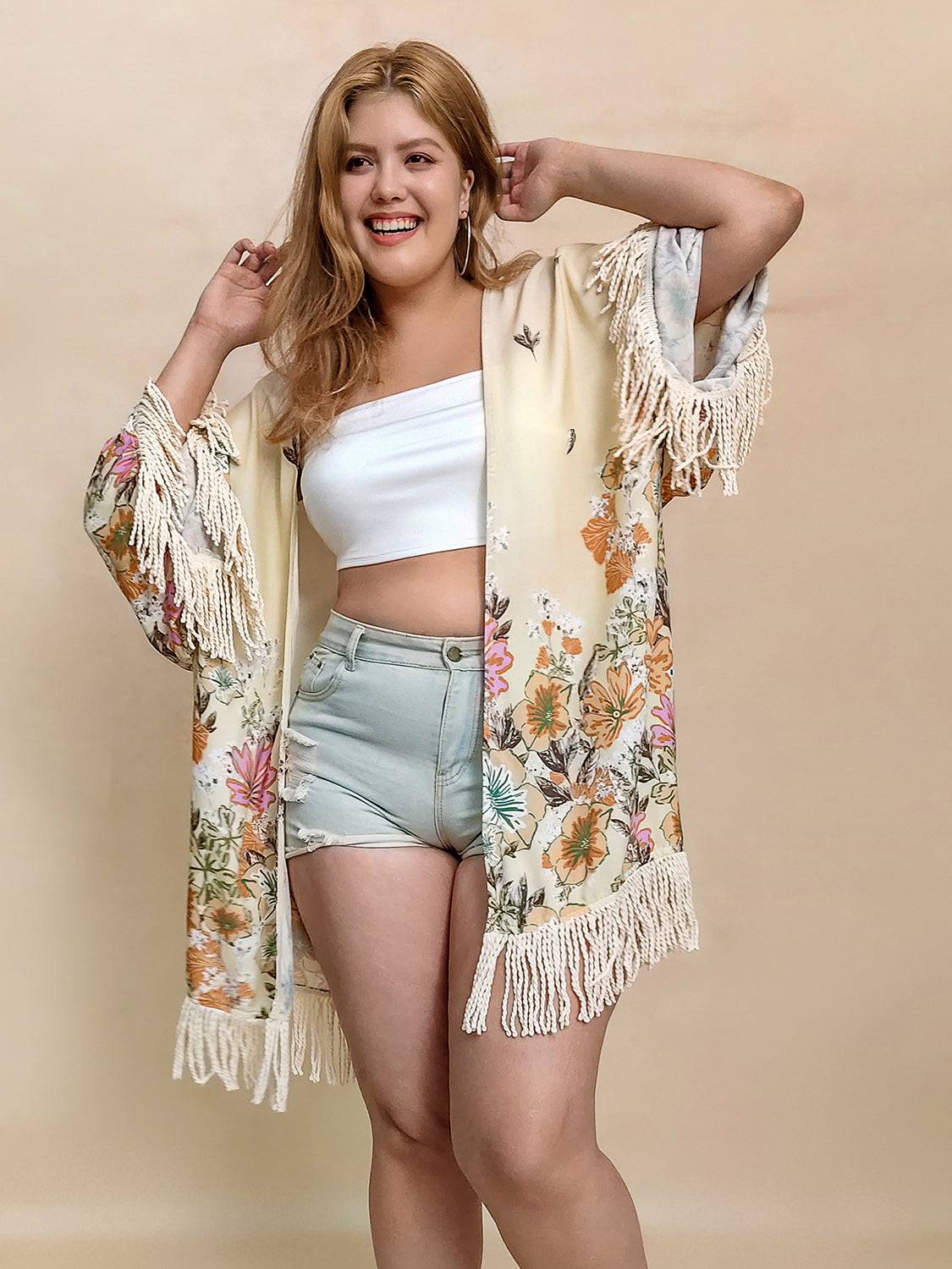 Open front floral cardigan with fringe details