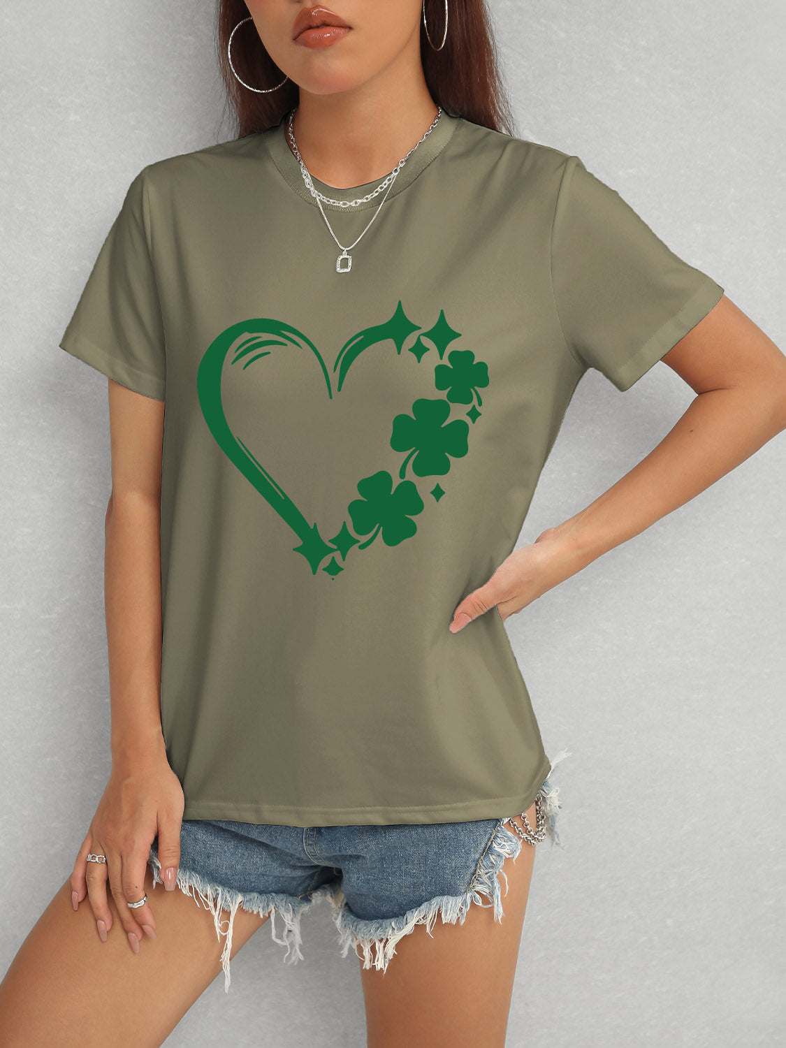 Green Heart Lucky Clover T-Shirt with denim shorts