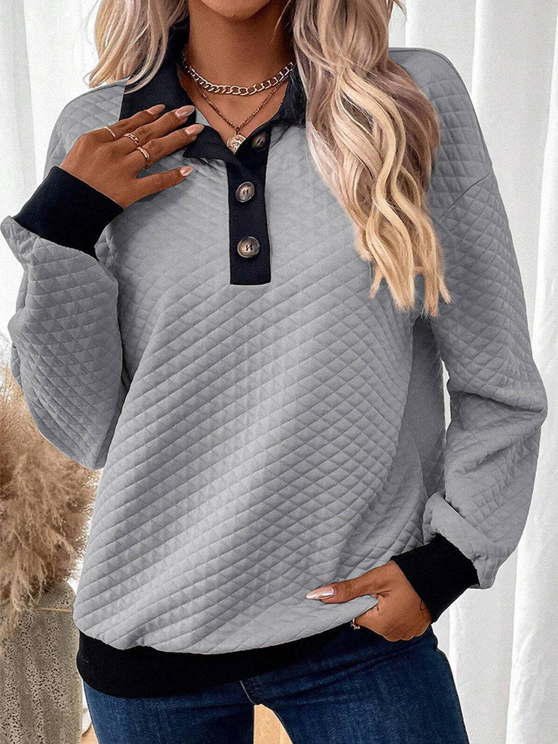 Gray texture quarter button long sleeve sweatshirt, side view