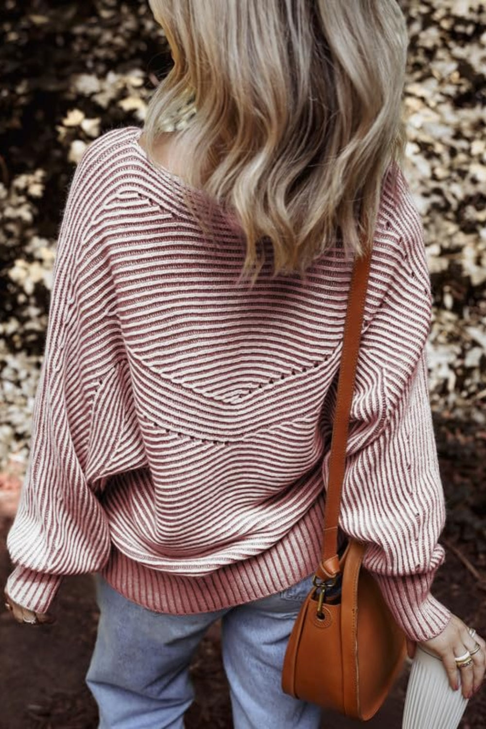 Back view of pink textured striped long sleeve top