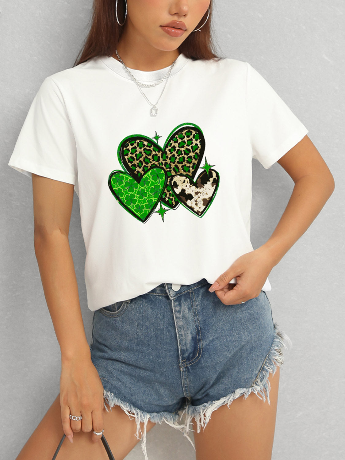 White heart print t-shirt with denim shorts