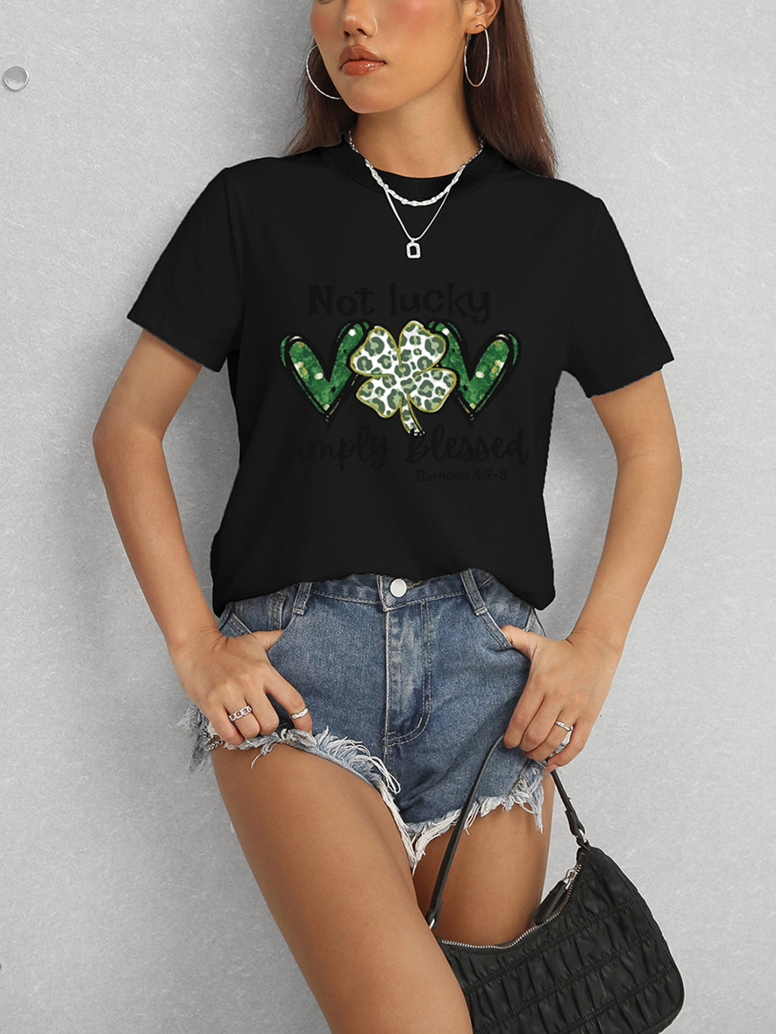 Black T-shirt featuring Romans 4:7-8 text