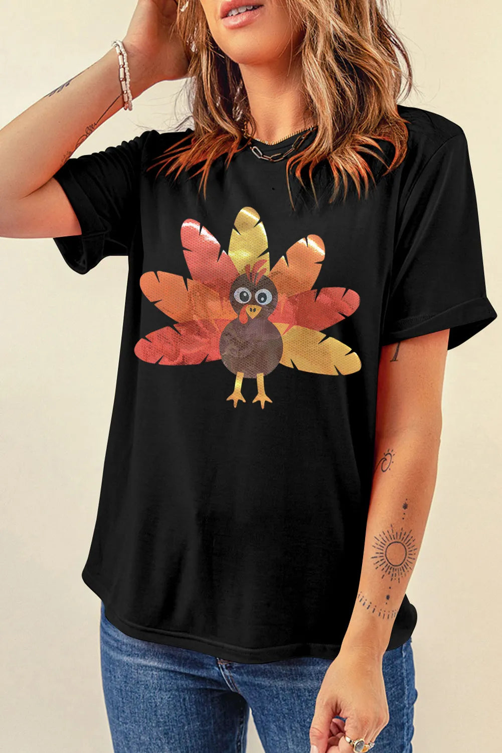 Black graphic T-shirt with colorful turkey design