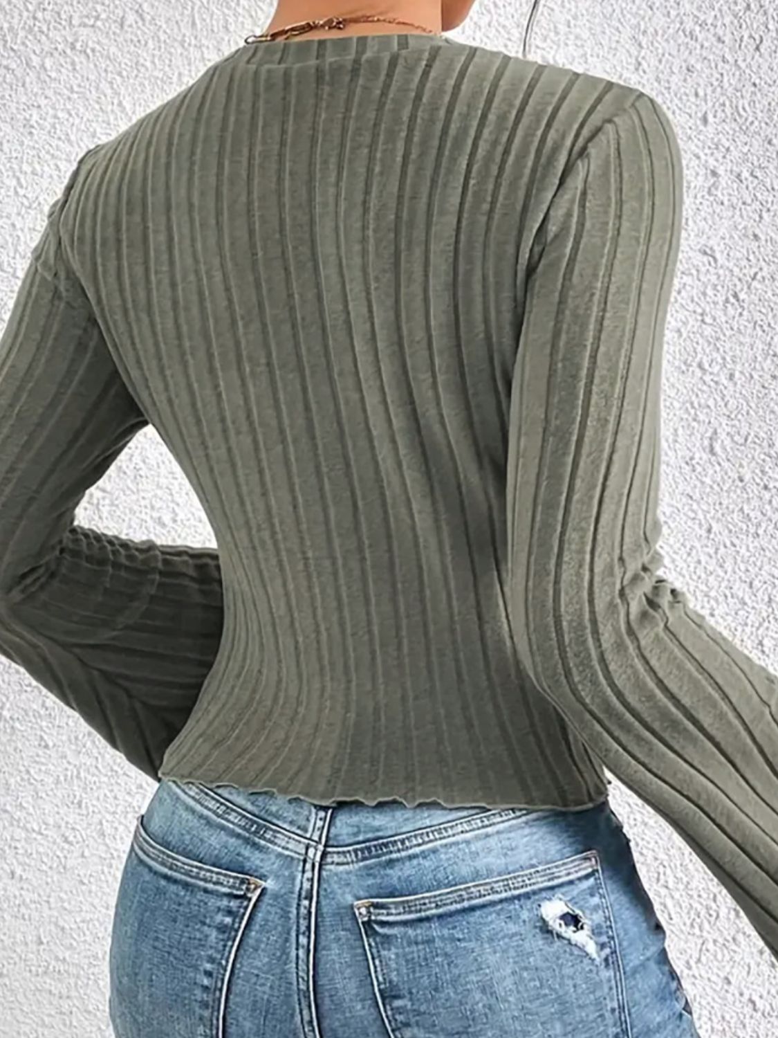 Back view of green ribbed flare sleeve t-shirt