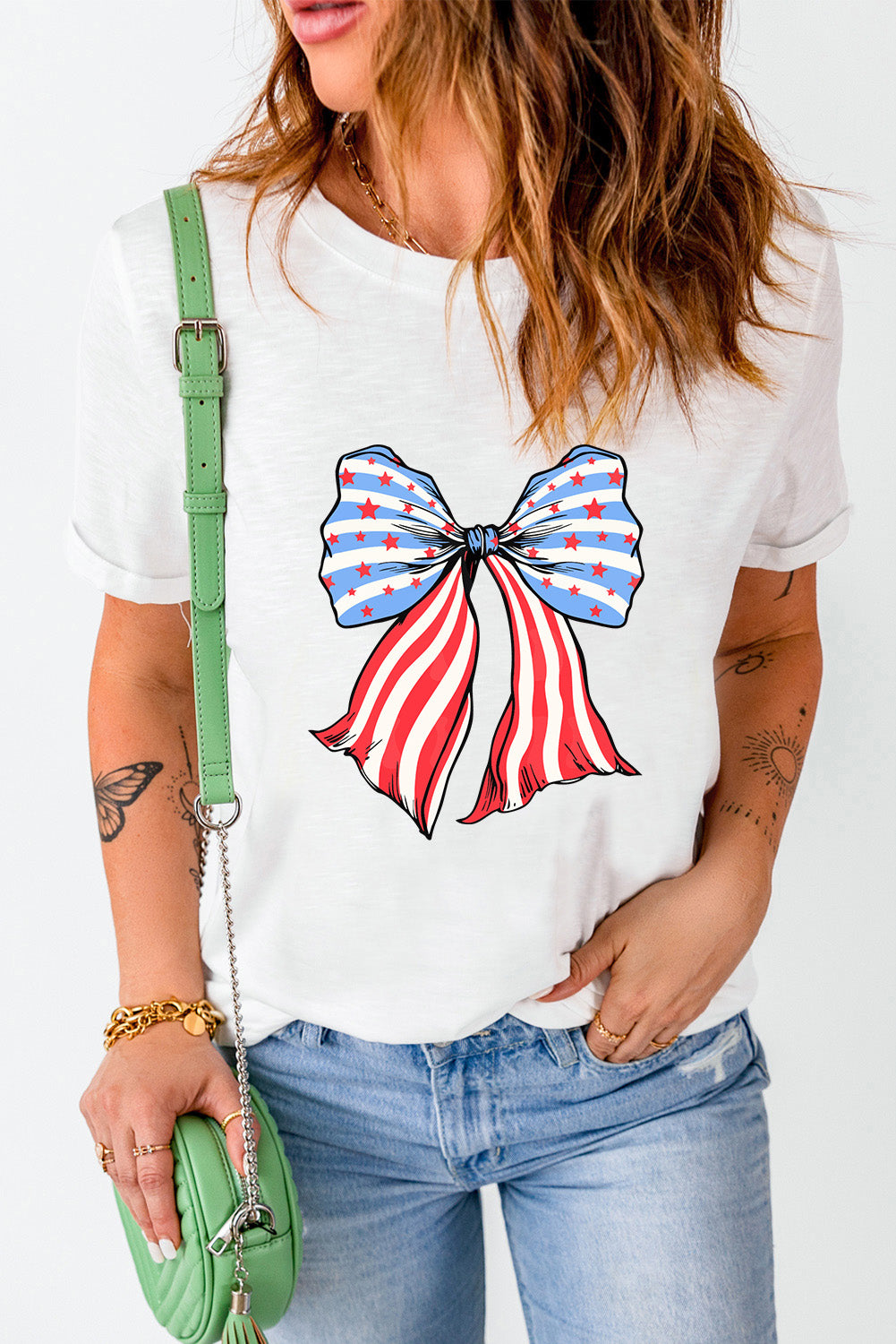 White T-shirt with bow graphic, round neck, short sleeves.