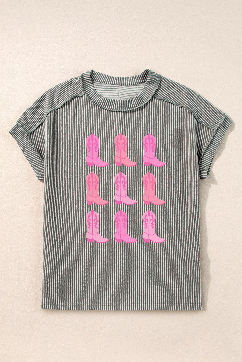 Front view of striped T-shirt with pink boots graphic