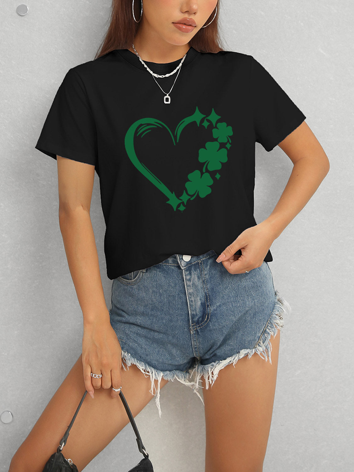 Black Heart Lucky Clover T-Shirt and denim shorts