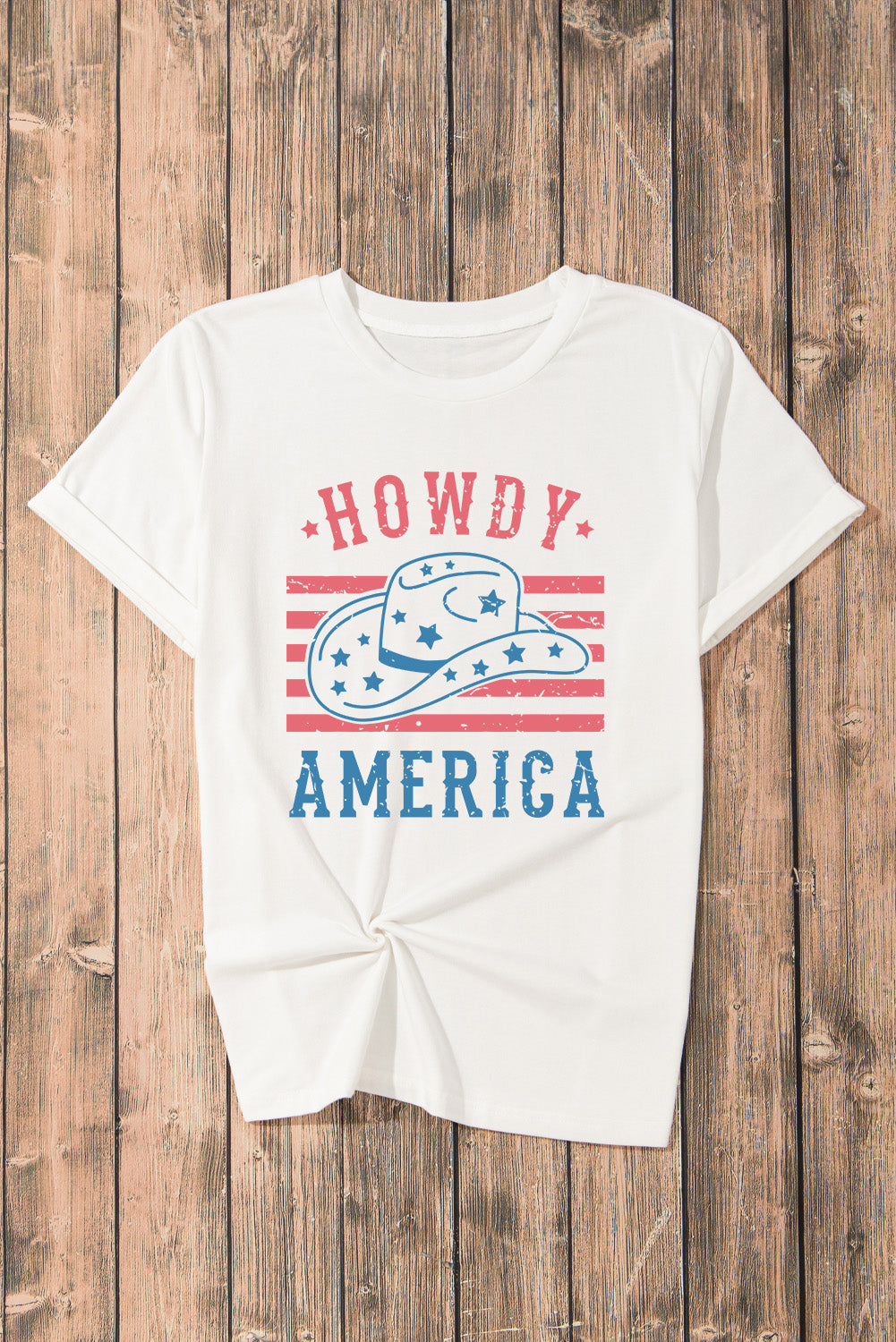 Howdy America graphic T-shirt on wooden background