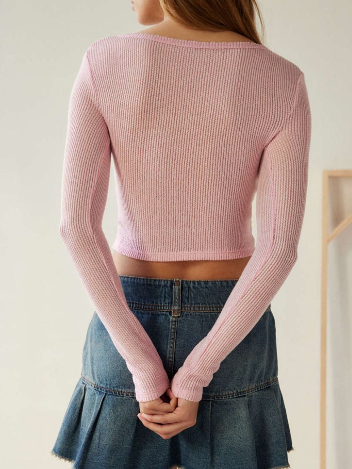Pink notched long sleeve t-shirt, back view