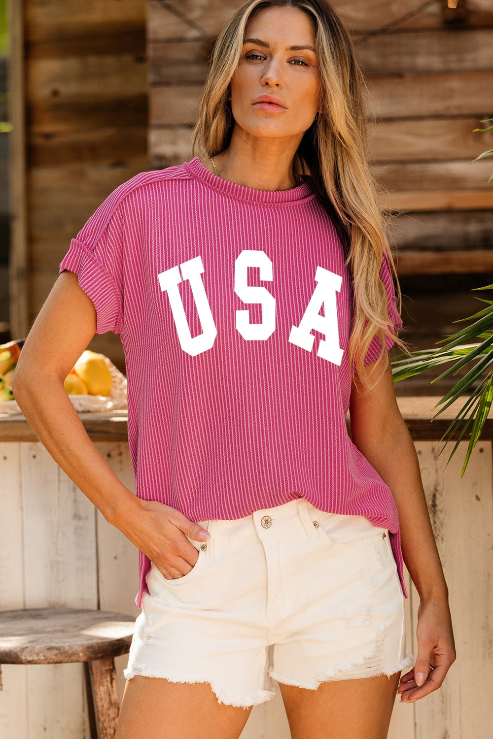 Pink USA round neck short sleeve t-shirt, side view