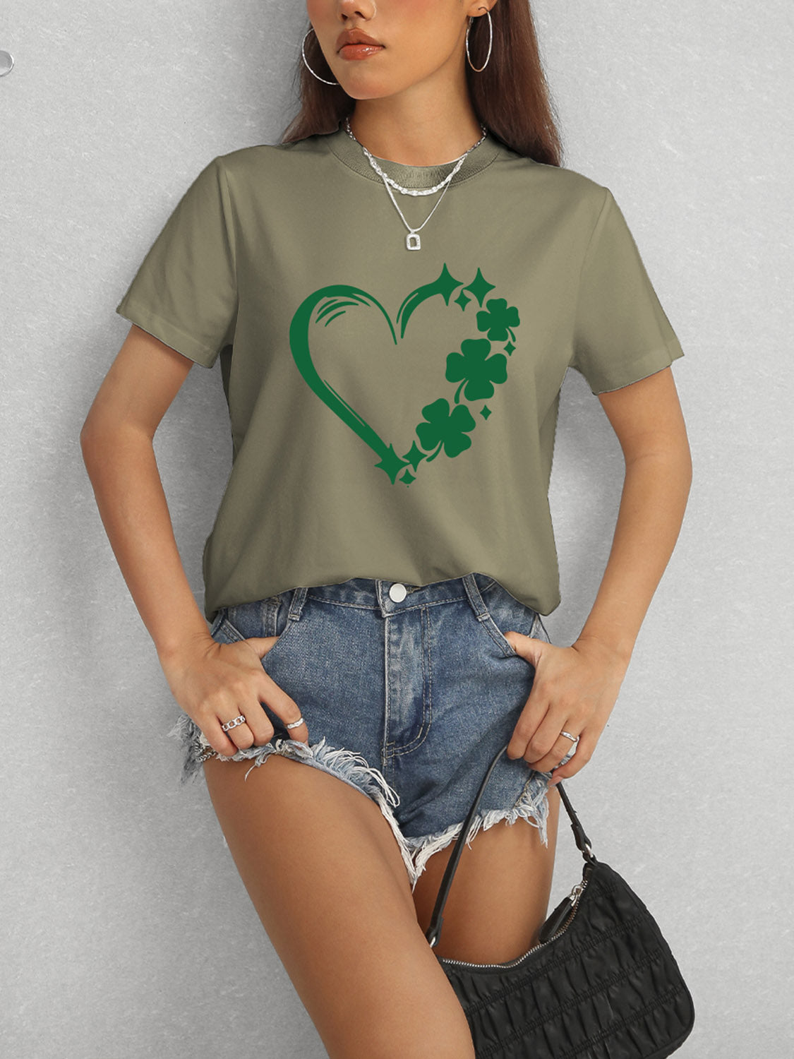 Green Heart Lucky Clover T-Shirt and denim shorts