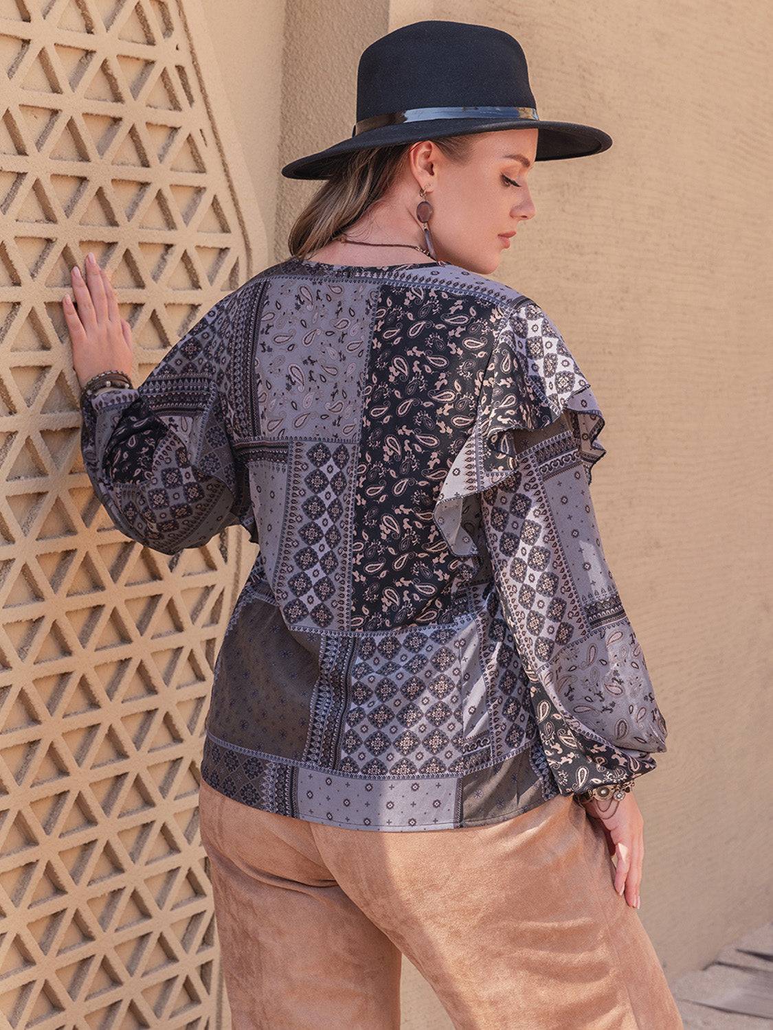 Back view of printed notched long sleeve ruffled blouse