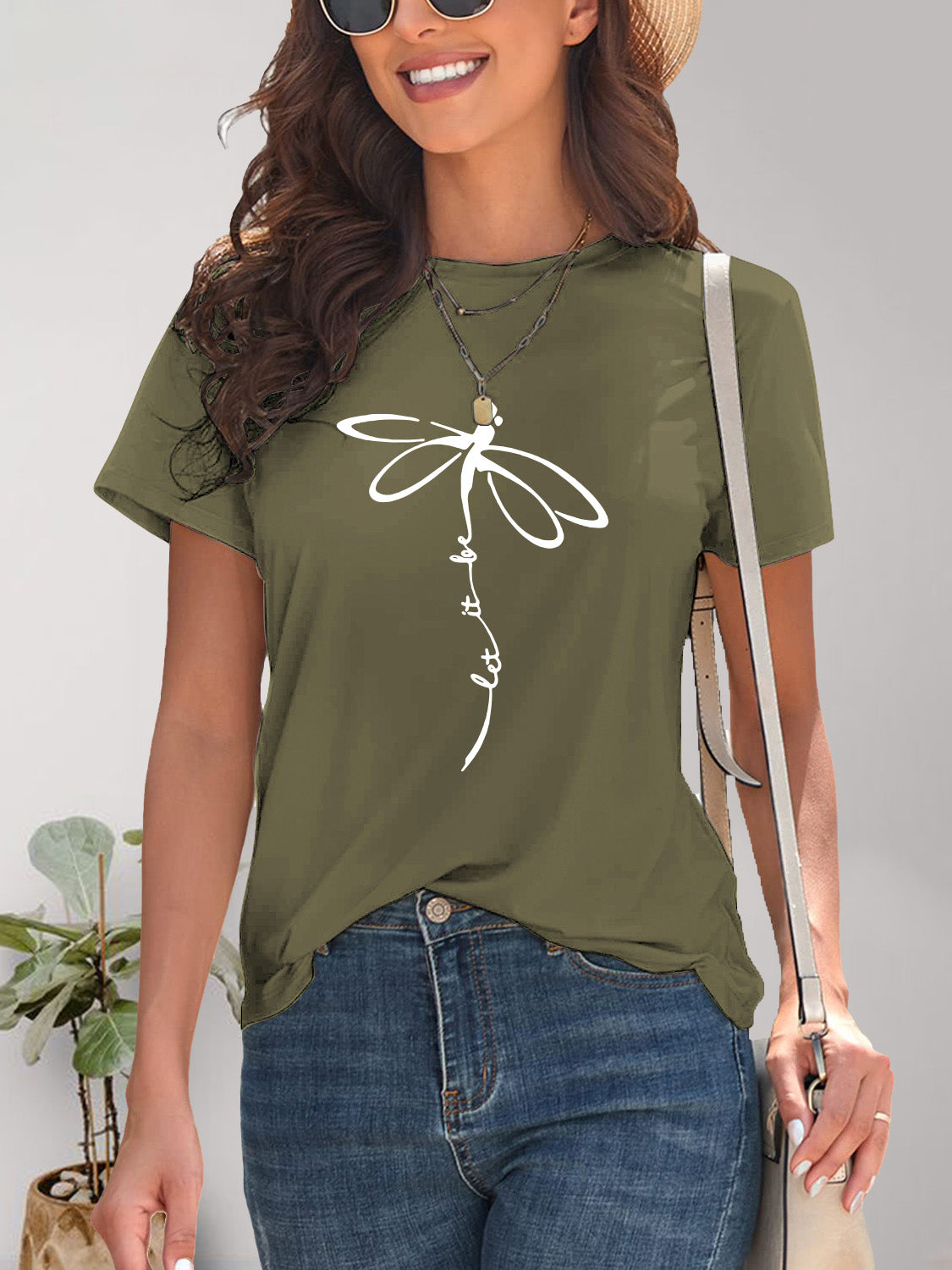 Olive green dragonfly graphic t-shirt with accessories