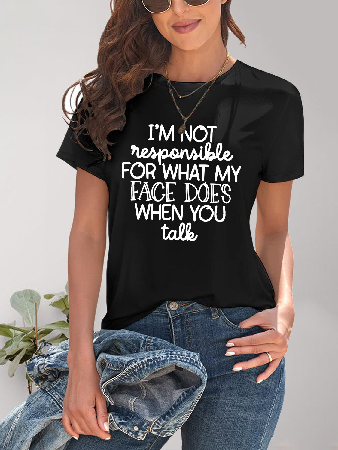 Black round neck T-shirt with letter graphic