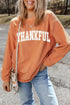 THANKFUL orange sweatshirt with round neck and long sleeves