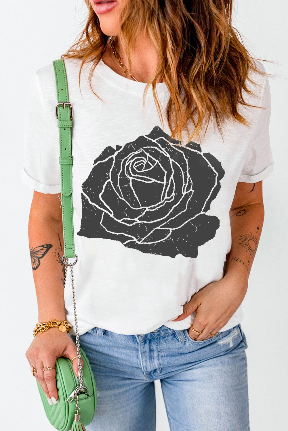 White T-shirt featuring black rose design, round neck, short sleeves