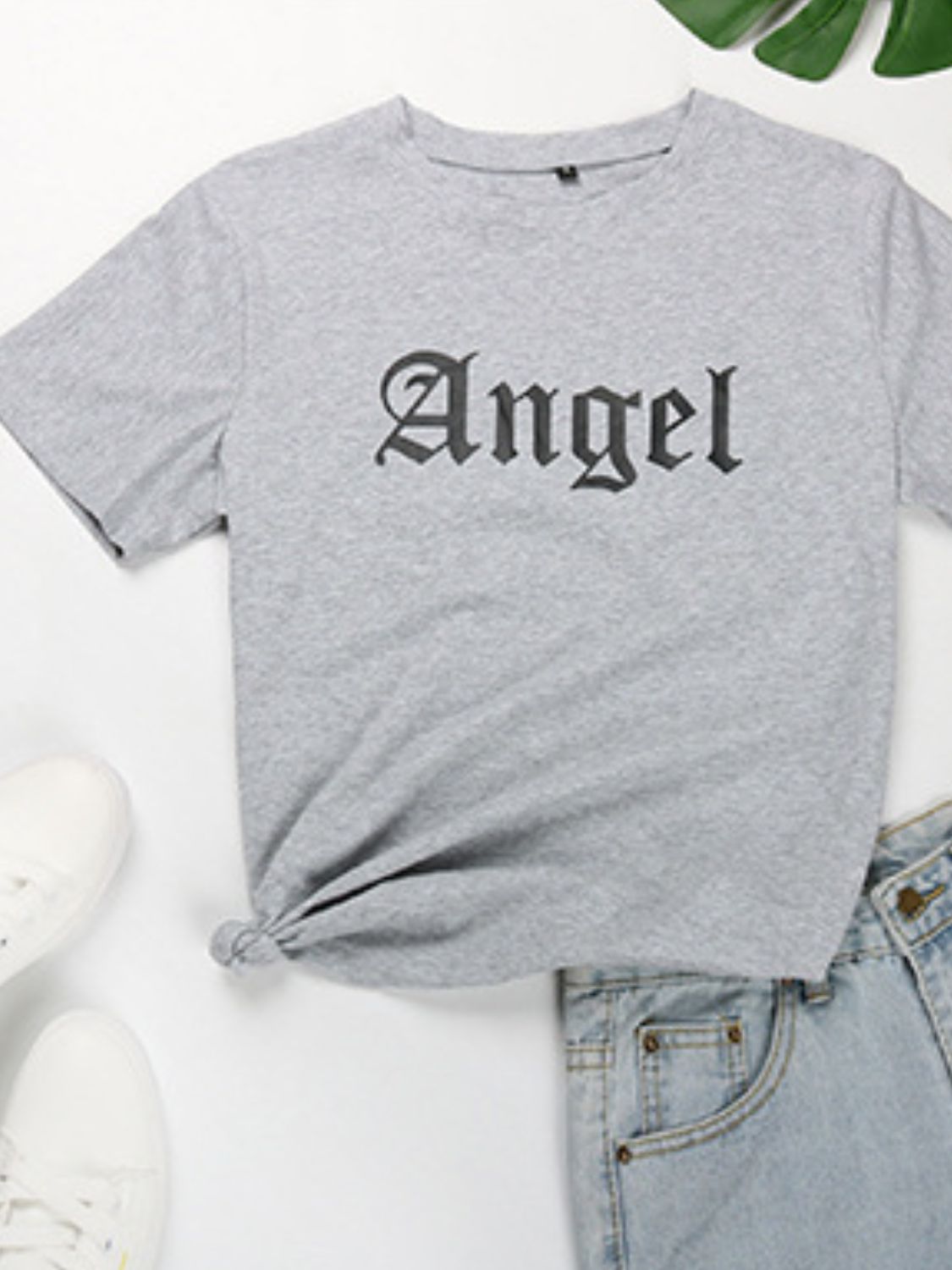Gray Angel T-shirt styled with denim shorts