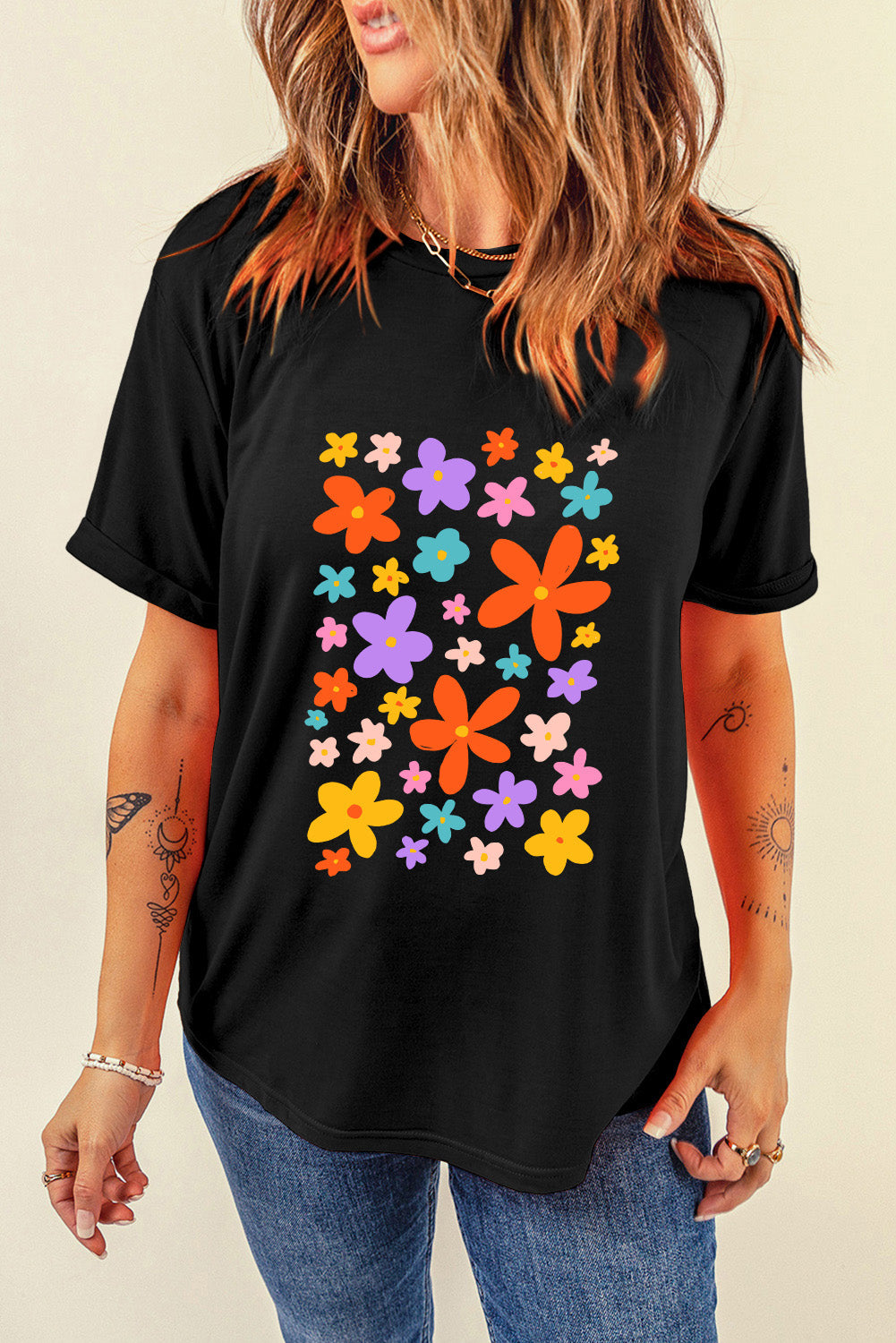 Black T-shirt with colorful flower graphic, round neck, short sleeves