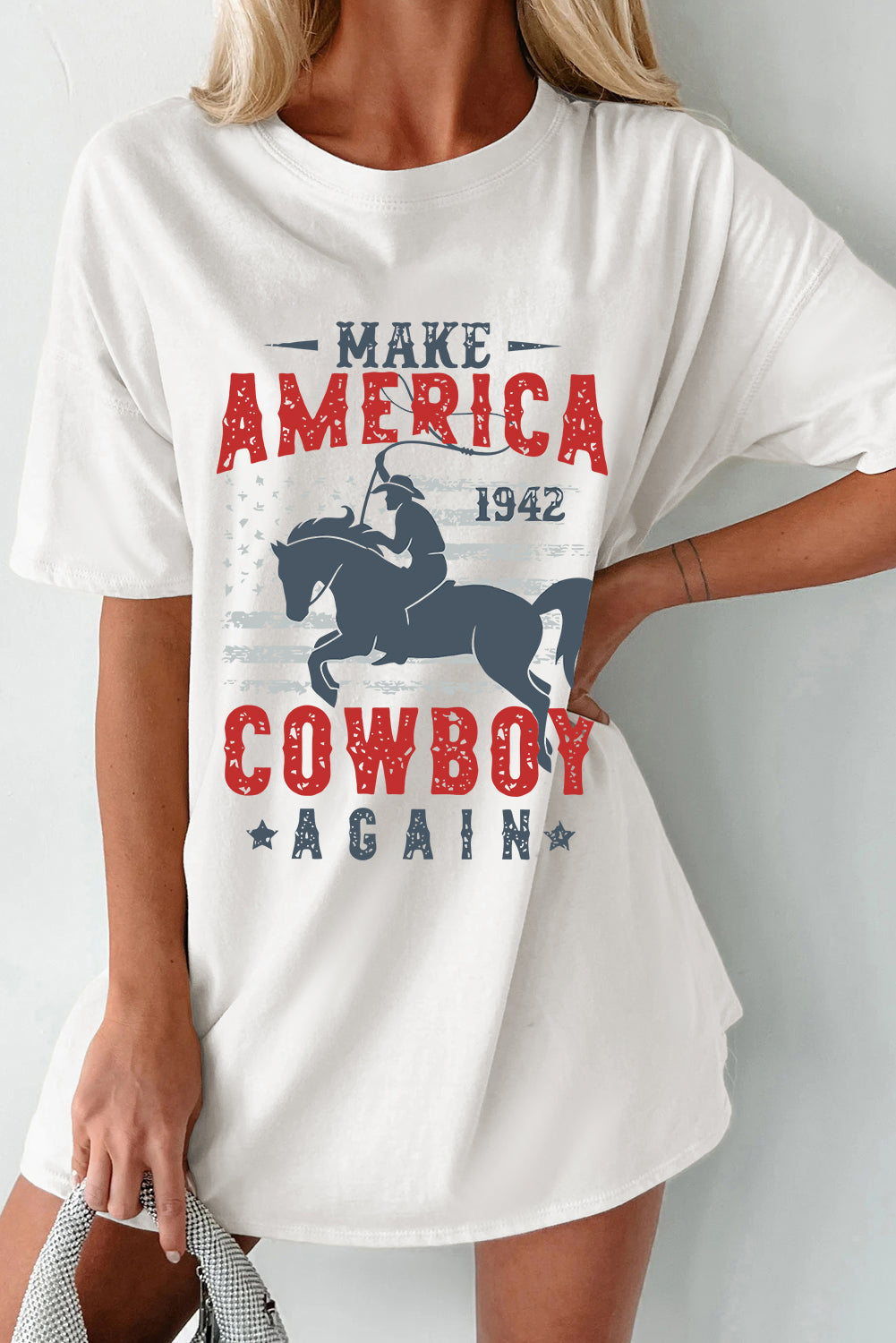 White T-shirt featuring cowboy graphic and bold text design