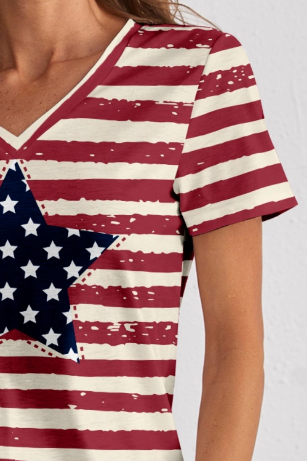 Close-up of striped T-shirt with star design