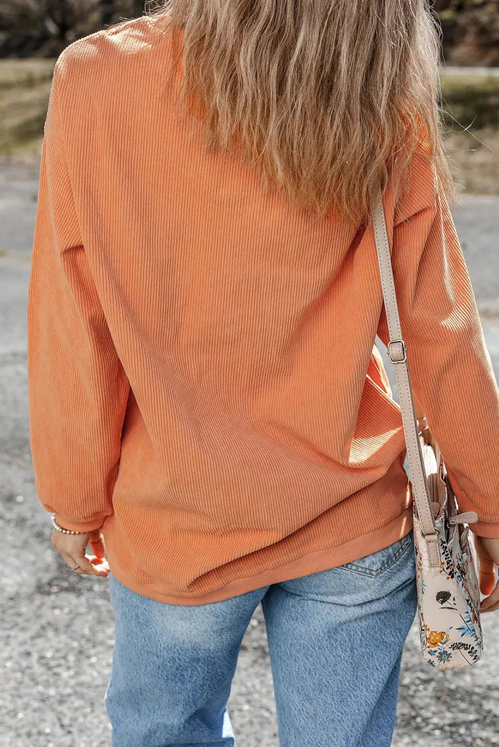 THANKFUL orange sweatshirt back view with floral bag
