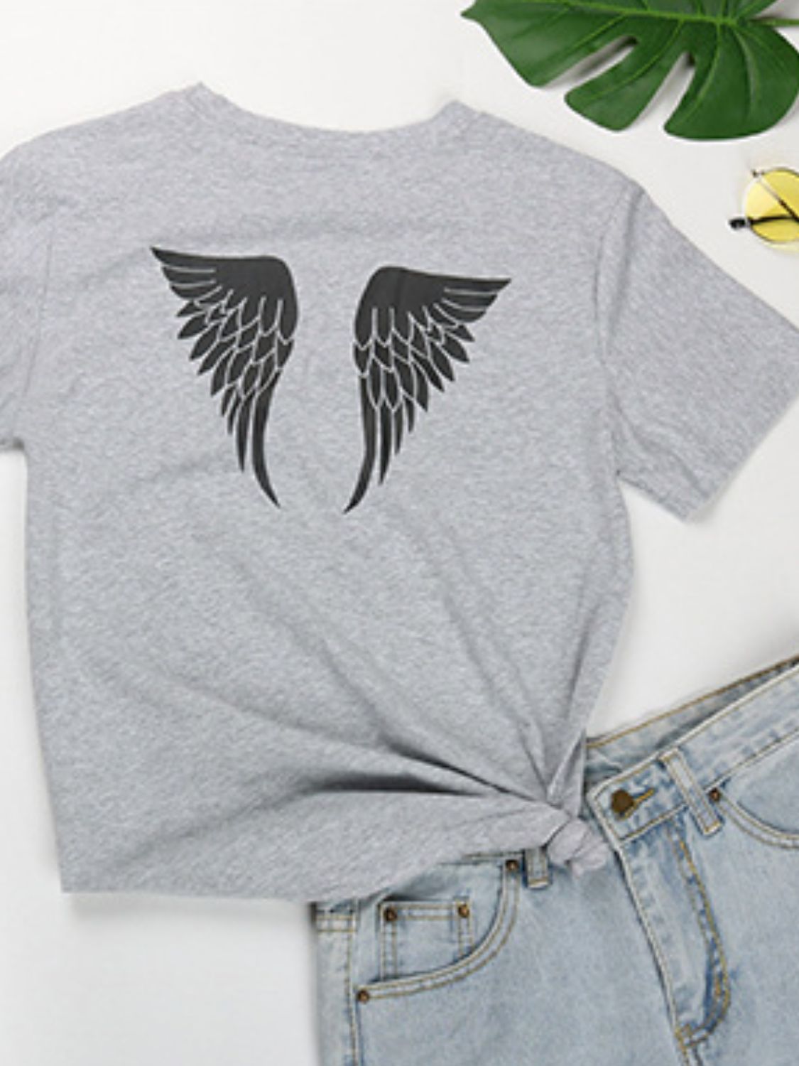 Back view of gray Angel T-shirt with wing design
