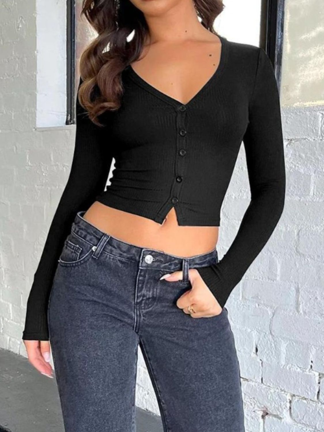 Black buttoned V-neck long sleeve T-shirt, side view