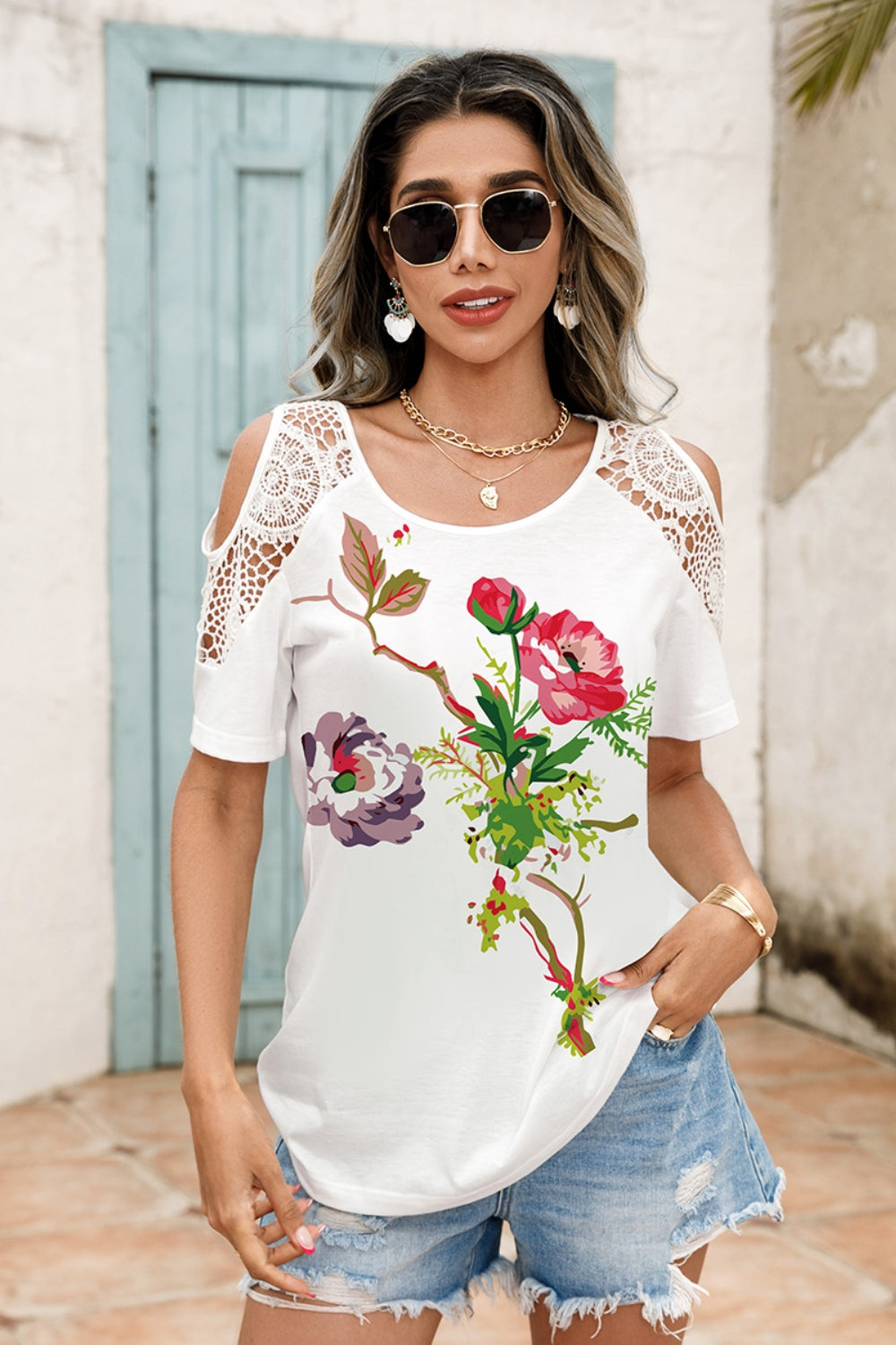Back view of bird print lace cold shoulder blouse