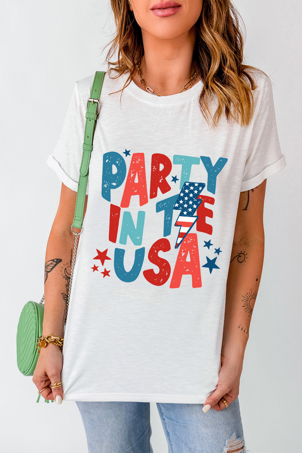 Party in the USA letter graphic round neck t-shirt styled with jeans
