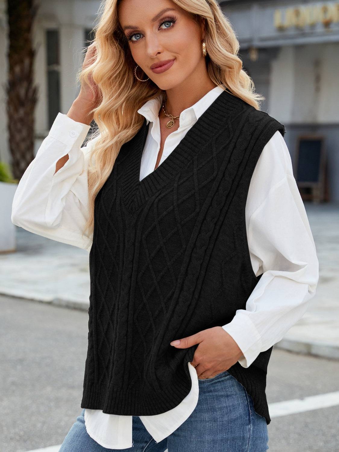 Black cable knit V-neck sweater vest, front view